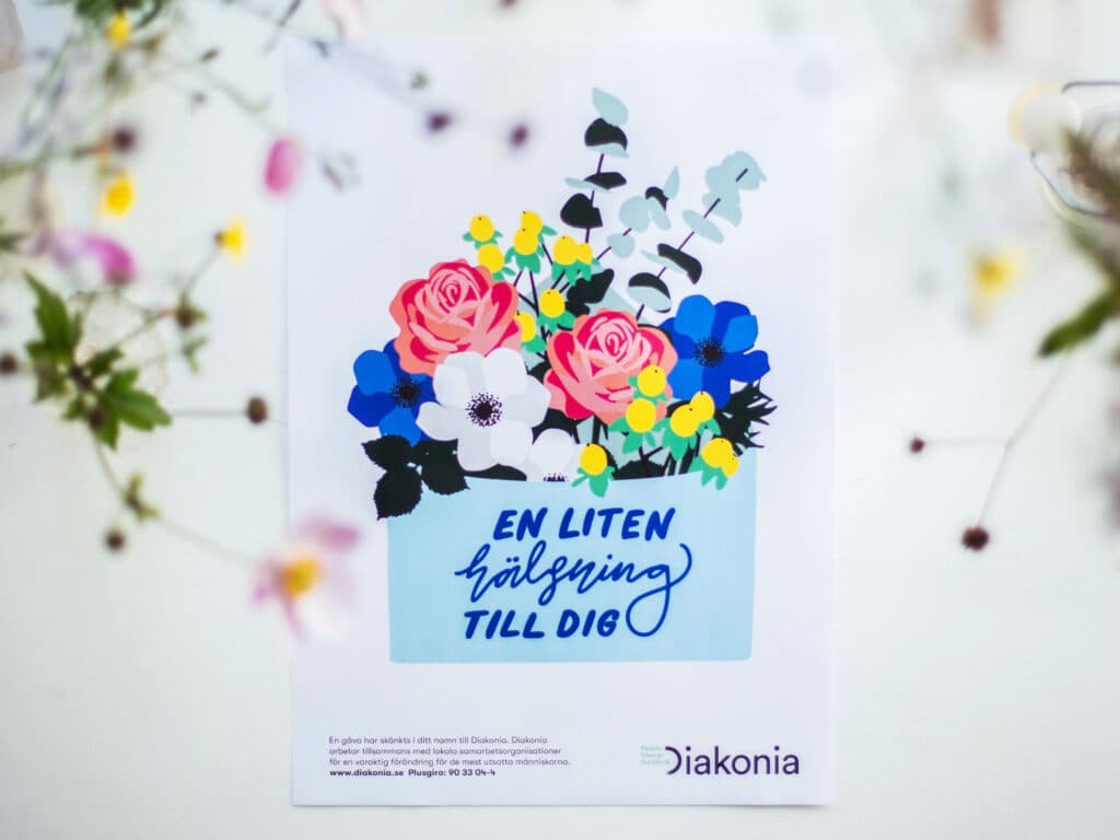 Bild på ett gåvobevis med höstblommor