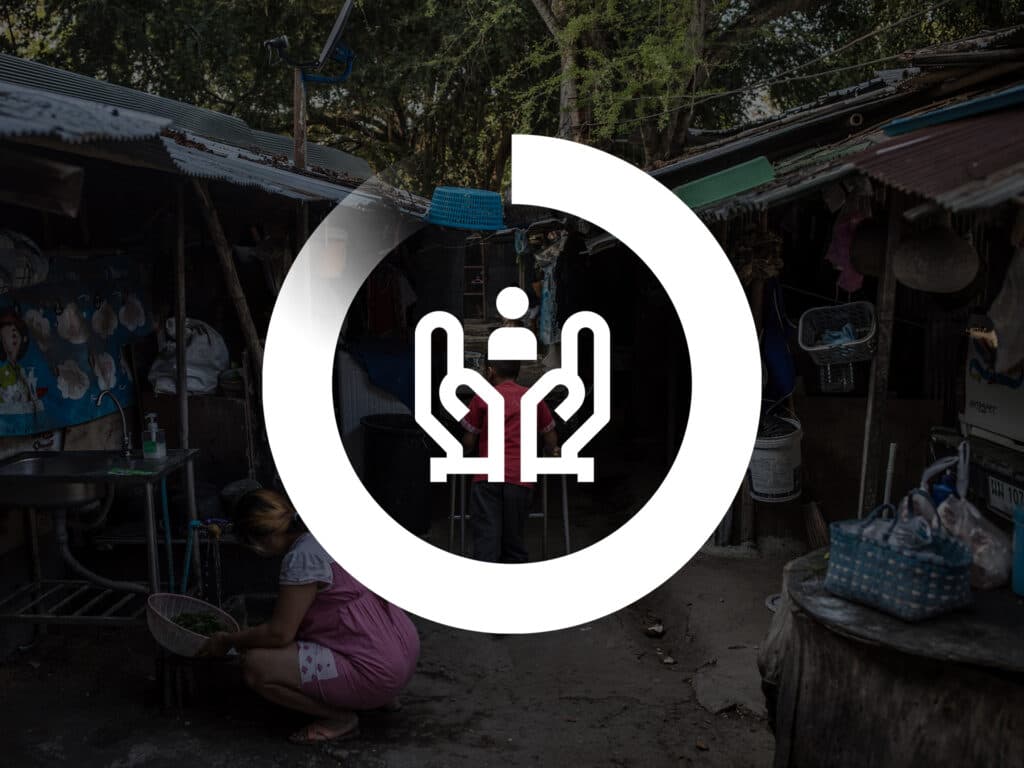 En grafisk symbol av två händer som håller ett hjärta.