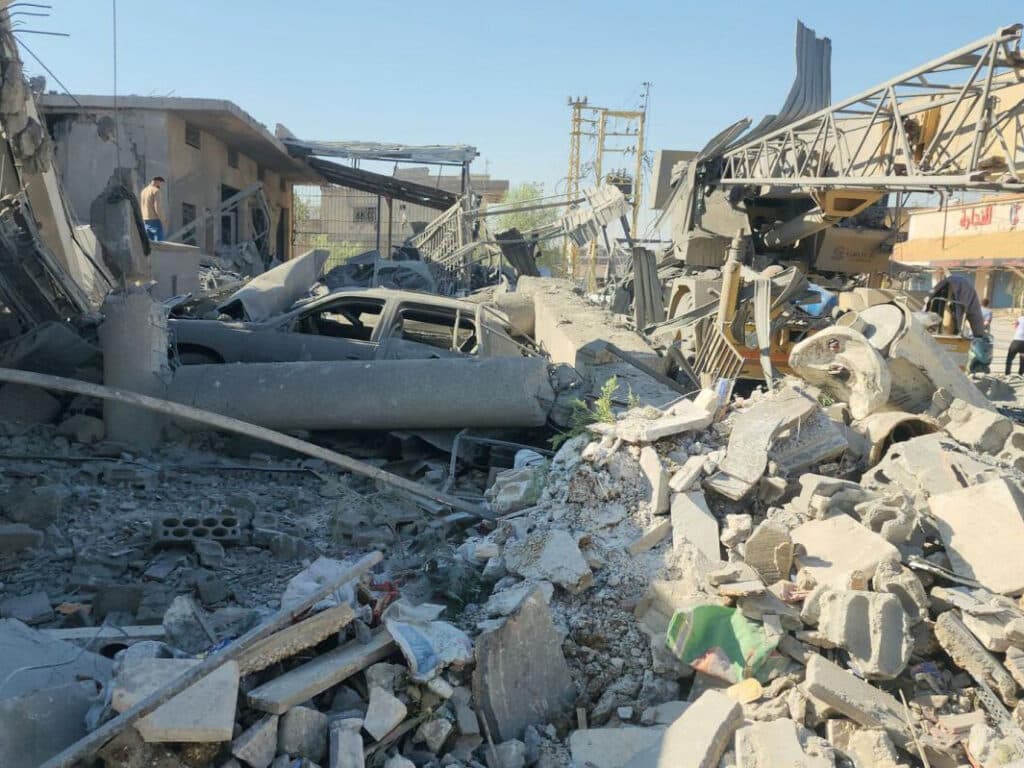 Foto: ACT Alliance Ruiner och rasmassor av ett hus.