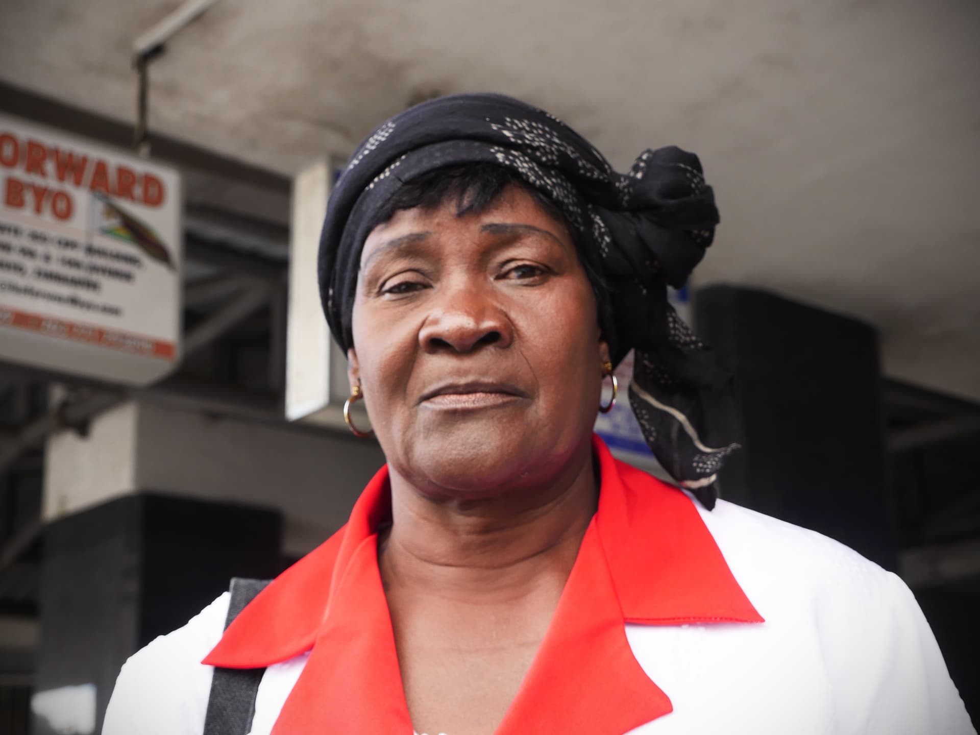 Photo: Diakonia Portrait of woman with red shirt