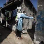 A health worker sanitising houses in a poor neighborhood in the Gaza Strip.