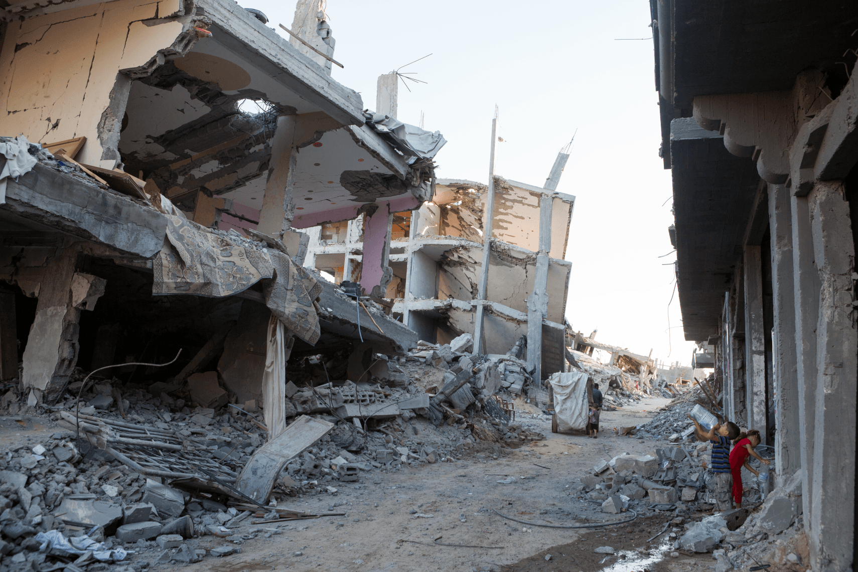 Severely damaged houses and rubble.