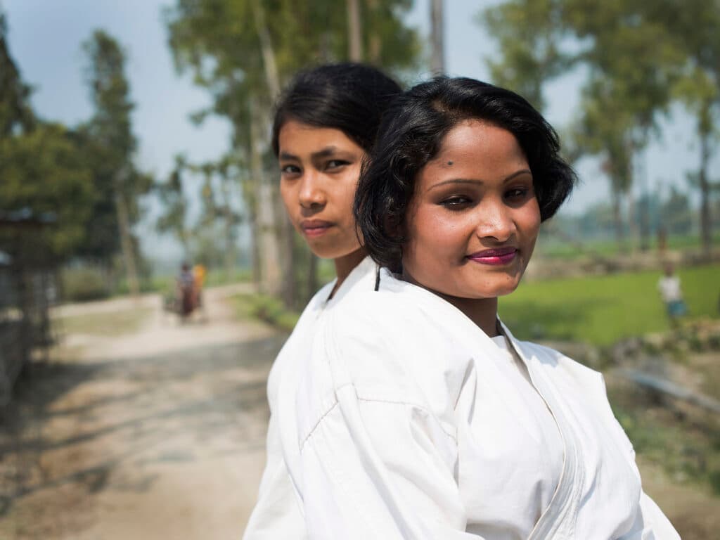 Two girls in karate clothes