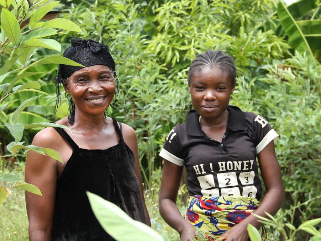 Photo: Diakonia Victorine standing next to her daughter