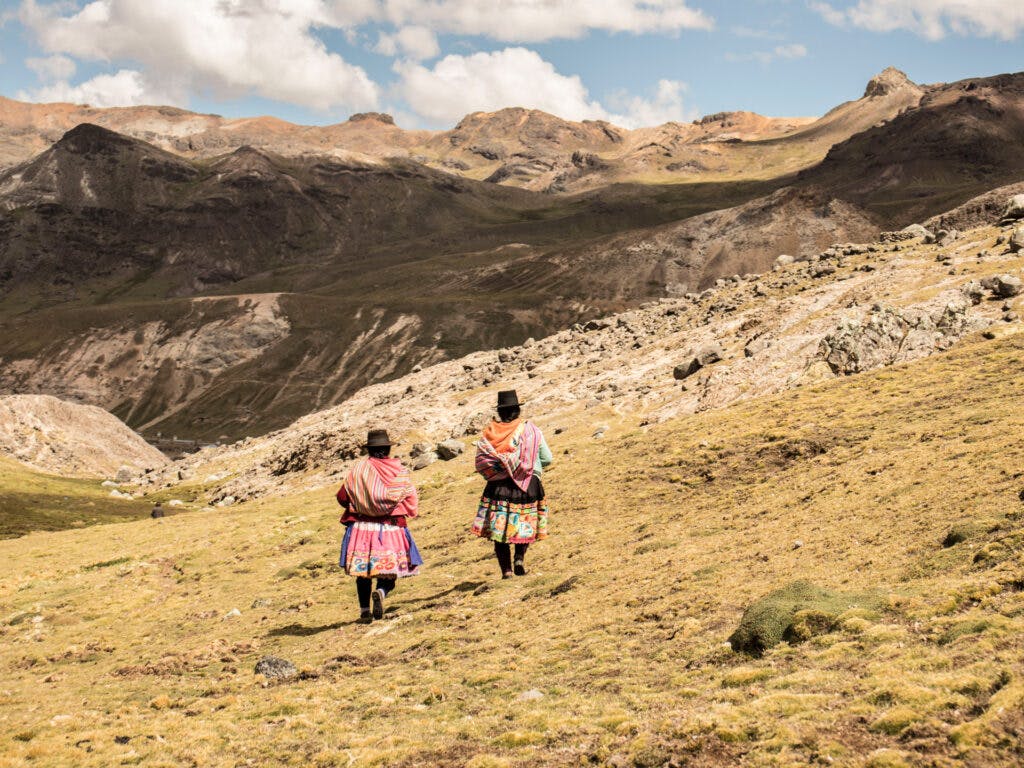 Women walking in the highlands in Peru