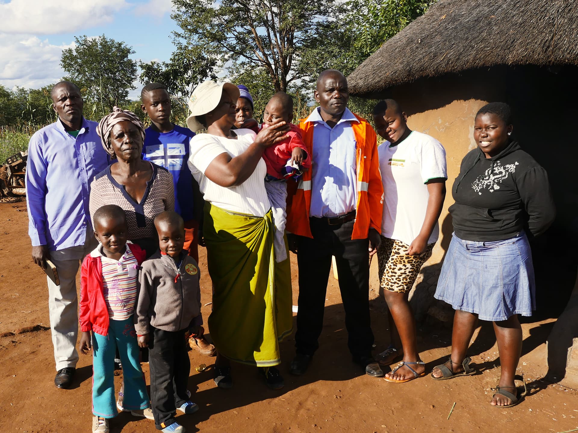 Photo: Diakonia A big family standing outside their house