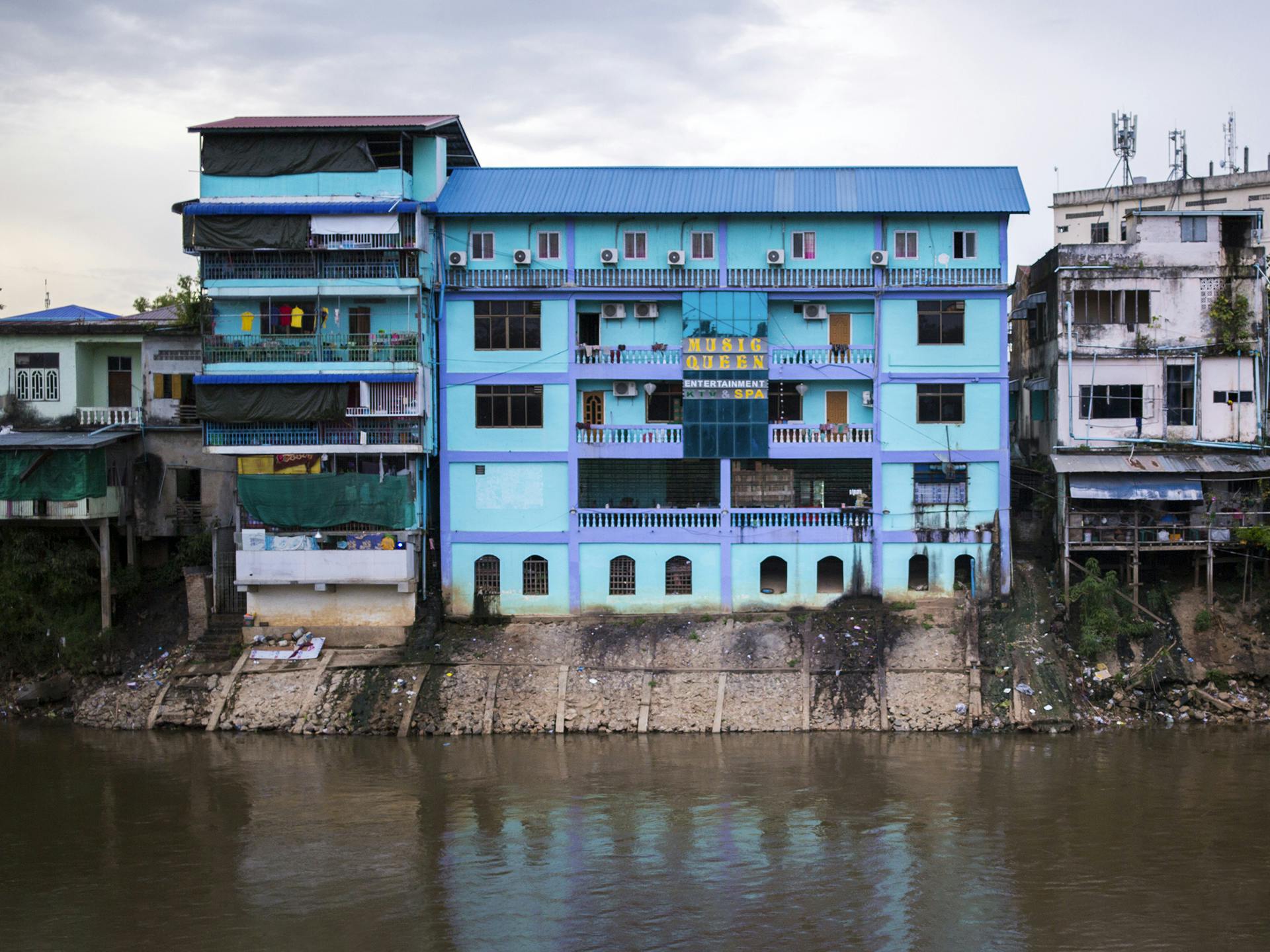 A view of a river and a house by the river